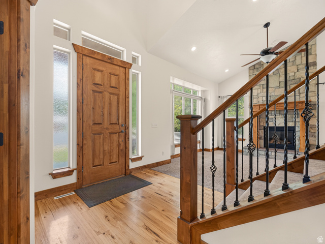 1279 West 1500th Street North Mapleton, UT 84664 - Photo 6 of 83 Grand entryway featuring a solid wood door with sidelights and transom windows