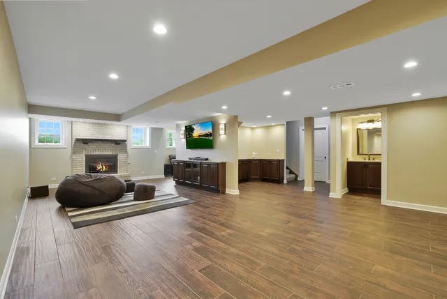 a view of a room with gym equipment and a window
