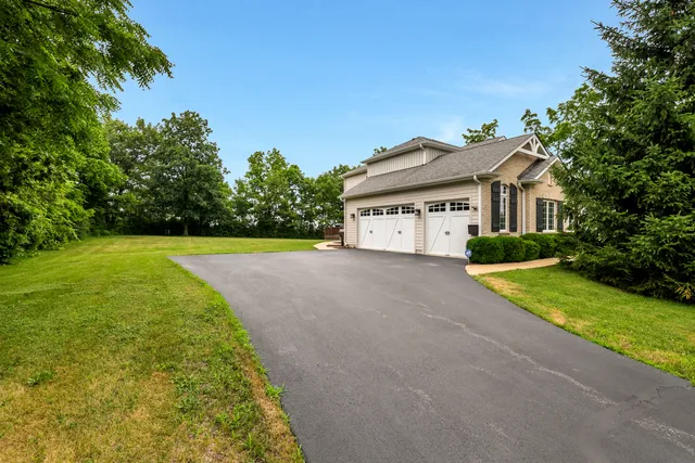 a house with a yard and a trees