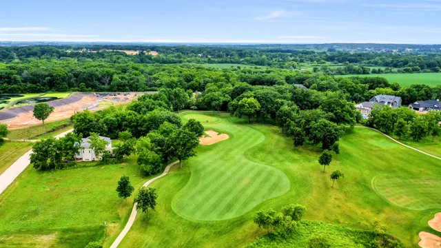 a view of a garden with a lake