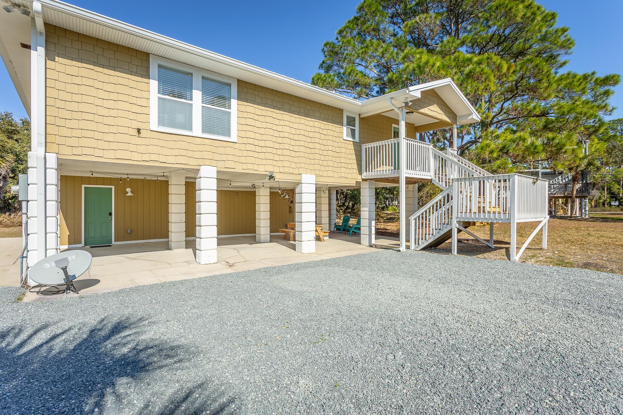 1446 Cypress Street Alligator Point, FL 32346 - Photo 1 of 43