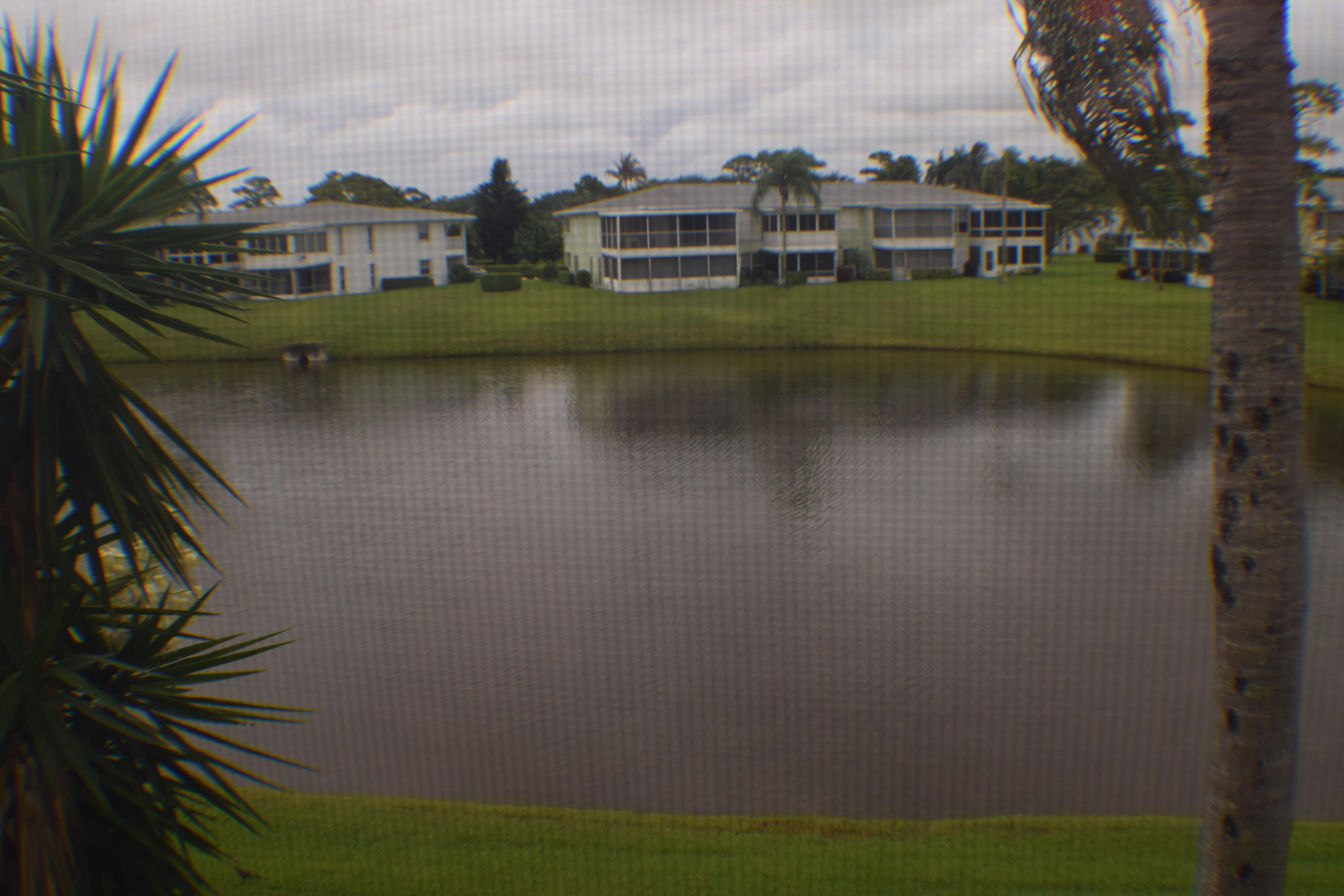 2820 Southwest 13th Street, Unit 203 Delray Beach, FL 33445 - Photo 28 of 44 Lake view from porch