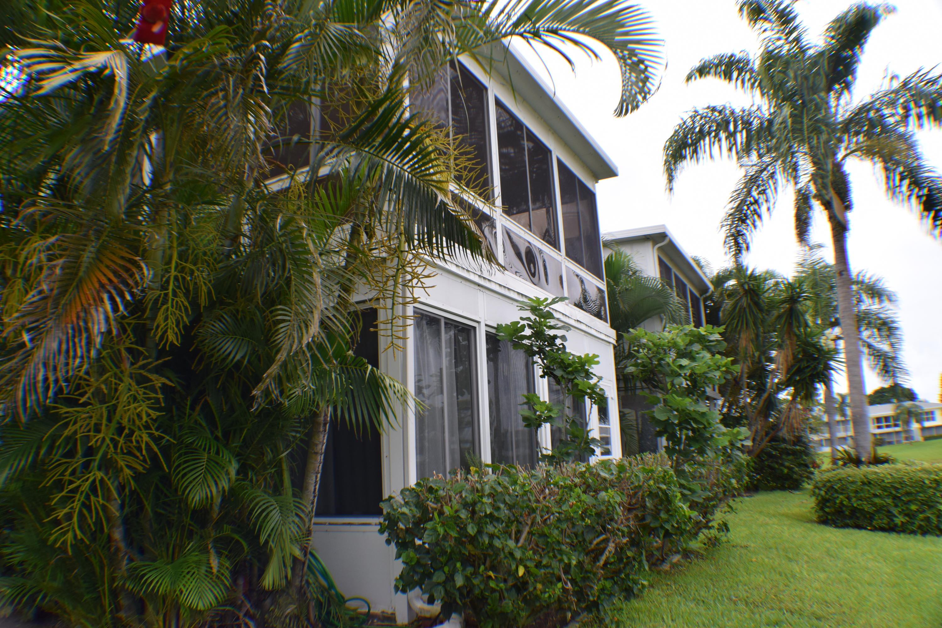 2820 Southwest 13th Street, Unit 203 Delray Beach, FL 33445 - Photo 29 of 44 Screened Porch