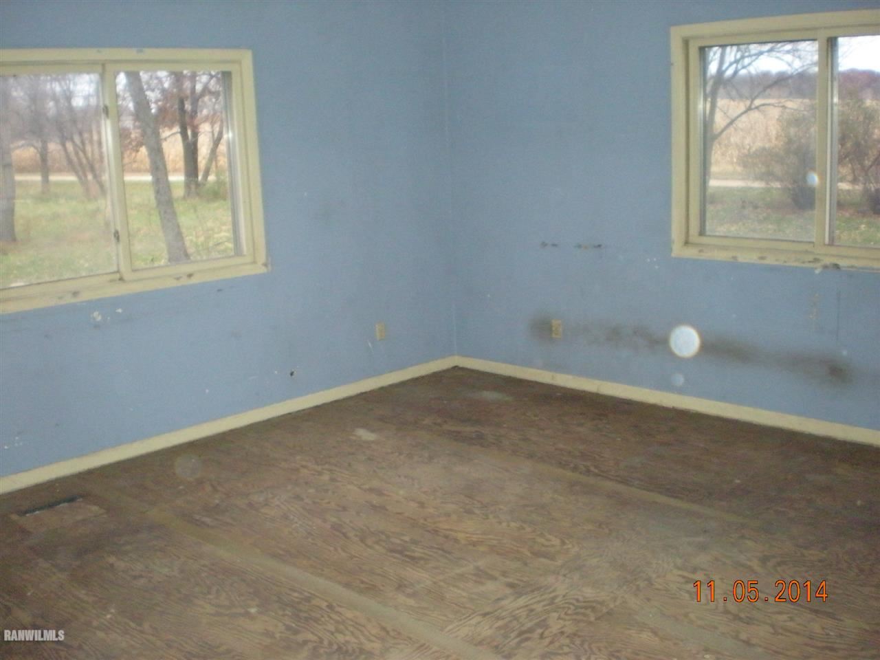12815 Blue Goose Road Morrison, IL 61270 - Photo 12 of 20 a view of an empty room with a window