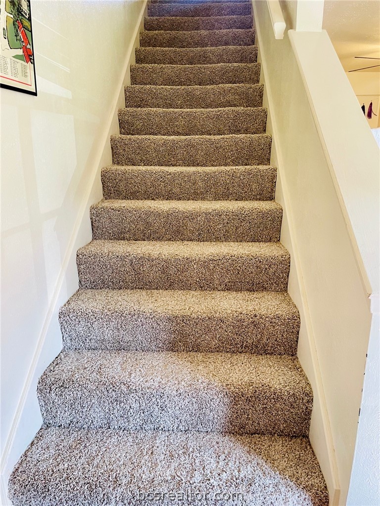 922 Spring Loop, Unit A College Station, TX 77840 - Photo 3 of 20 View of staircase