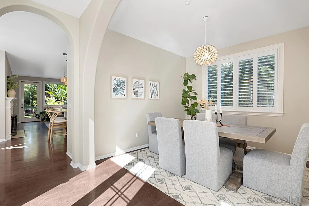 660 Cypress Hills Drive Encinitas, CA 92024 - Photo 22 of 38 a living room with furniture and a window