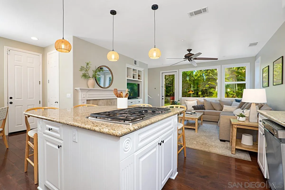 660 Cypress Hills Drive Encinitas, CA 92024 - Photo 9 of 38 a view of kitchen island with furniture and windows
