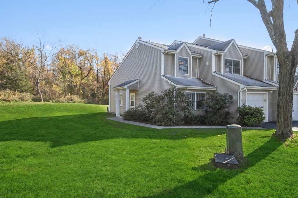 39 Deer Crossing Drive Fishkill, NY 12524 - Photo 1 of 35 a front view of a house with a yard