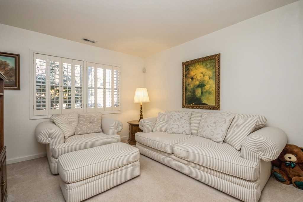 39 Deer Crossing Drive Fishkill, NY 12524 - Photo 14 of 35 a living room with furniture and a large window