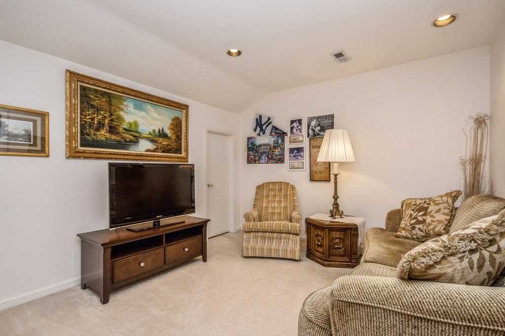 39 Deer Crossing Drive Fishkill, NY 12524 - Photo 20 of 35 a living room with furniture and a flat screen tv