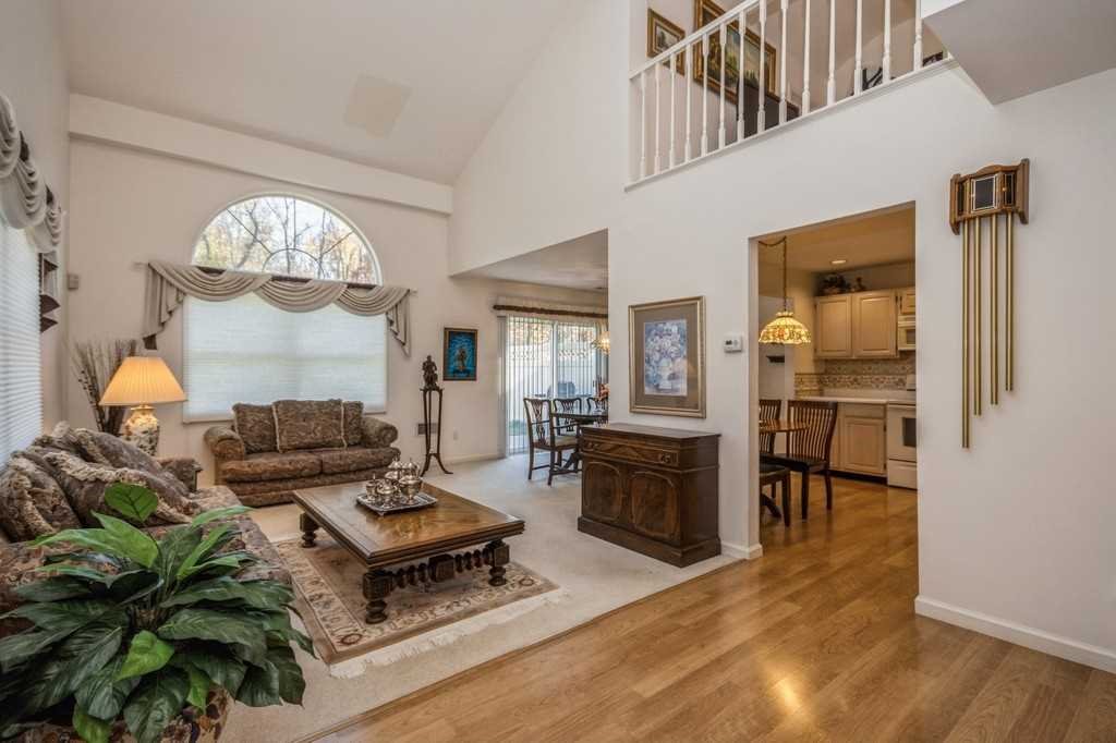 39 Deer Crossing Drive Fishkill, NY 12524 - Photo 4 of 35 a living room with furniture and a chandelier