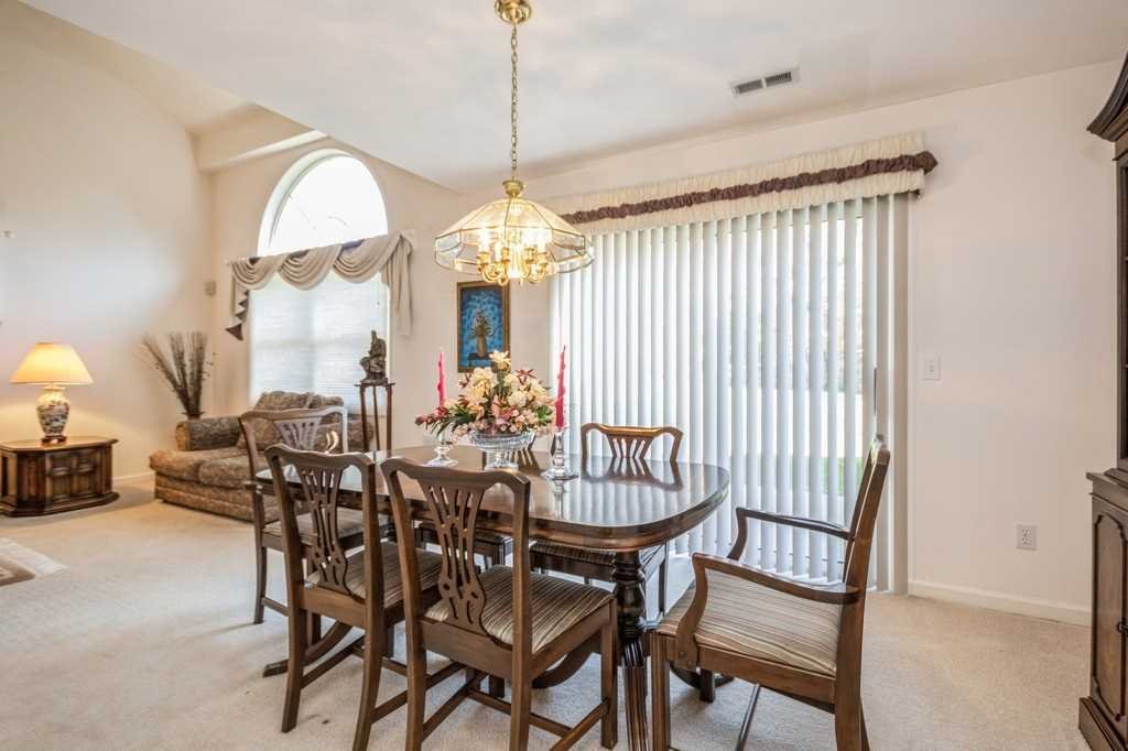 39 Deer Crossing Drive Fishkill, NY 12524 - Photo 8 of 35 a view of a dining room with furniture and chandelier