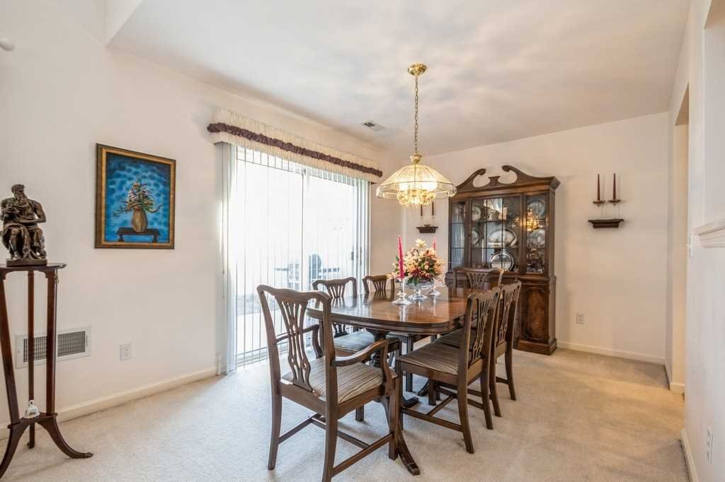 39 Deer Crossing Drive Fishkill, NY 12524 - Photo 9 of 35 a view of a dining room with furniture window and outside view