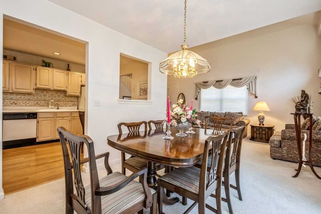 39 Deer Crossing Drive Fishkill, NY 12524 - Photo 10 of 35 a view of a dining room with furniture and chandelier