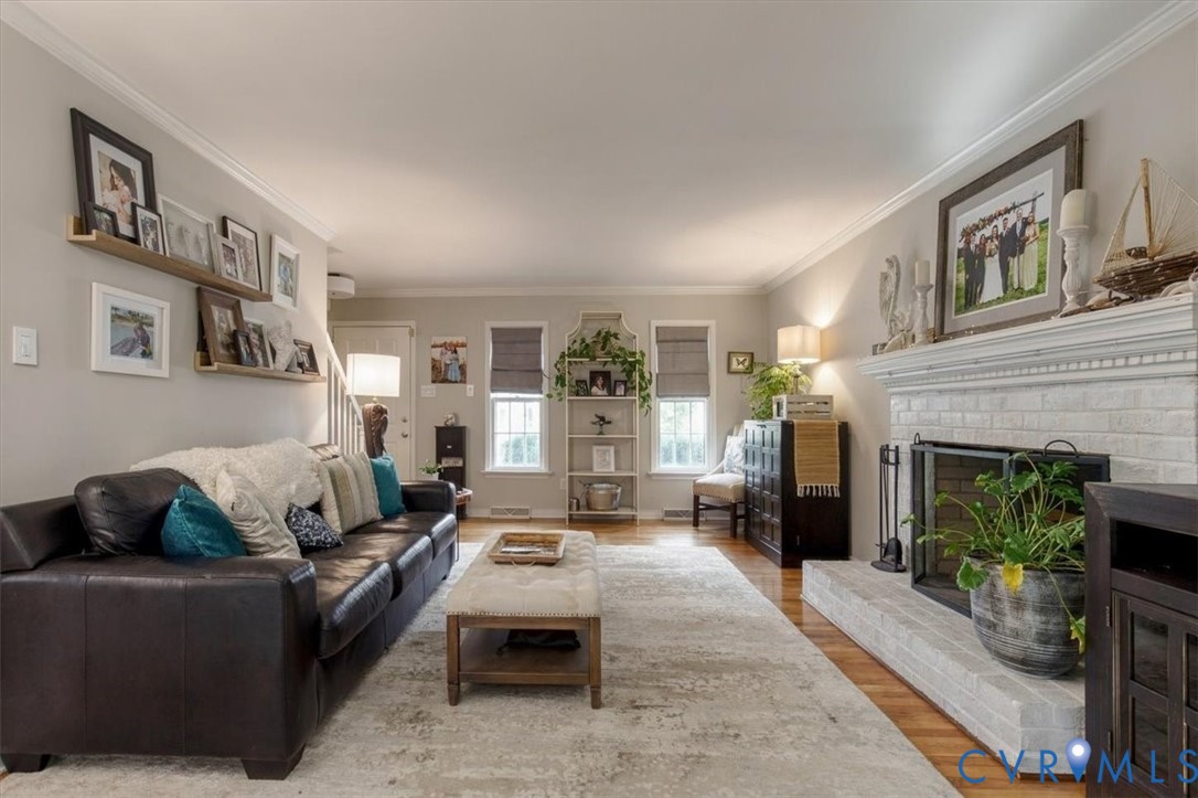 863 Watch Hill Road Midlothian, VA 23114 - Photo 15 of 62 Bright and spacious living room anchored by a fire
