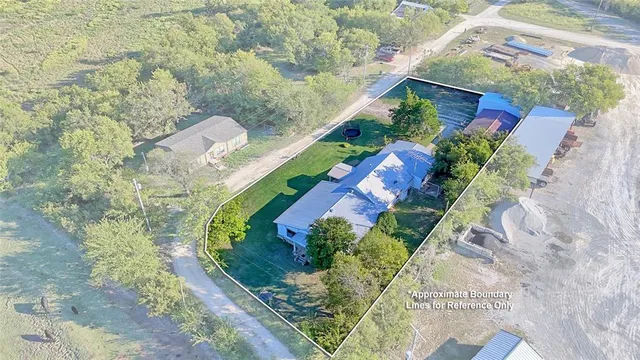 an aerial view of a city with lots of residential buildings