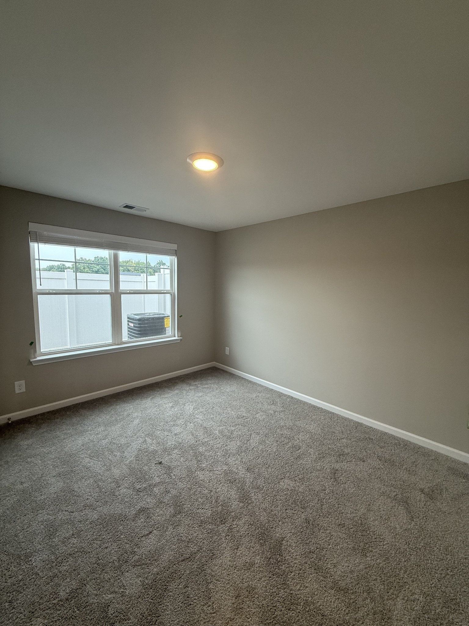 258 Selesia Lane Pleasant View, TN 37146 - Photo 6 of 17 an empty room with a window