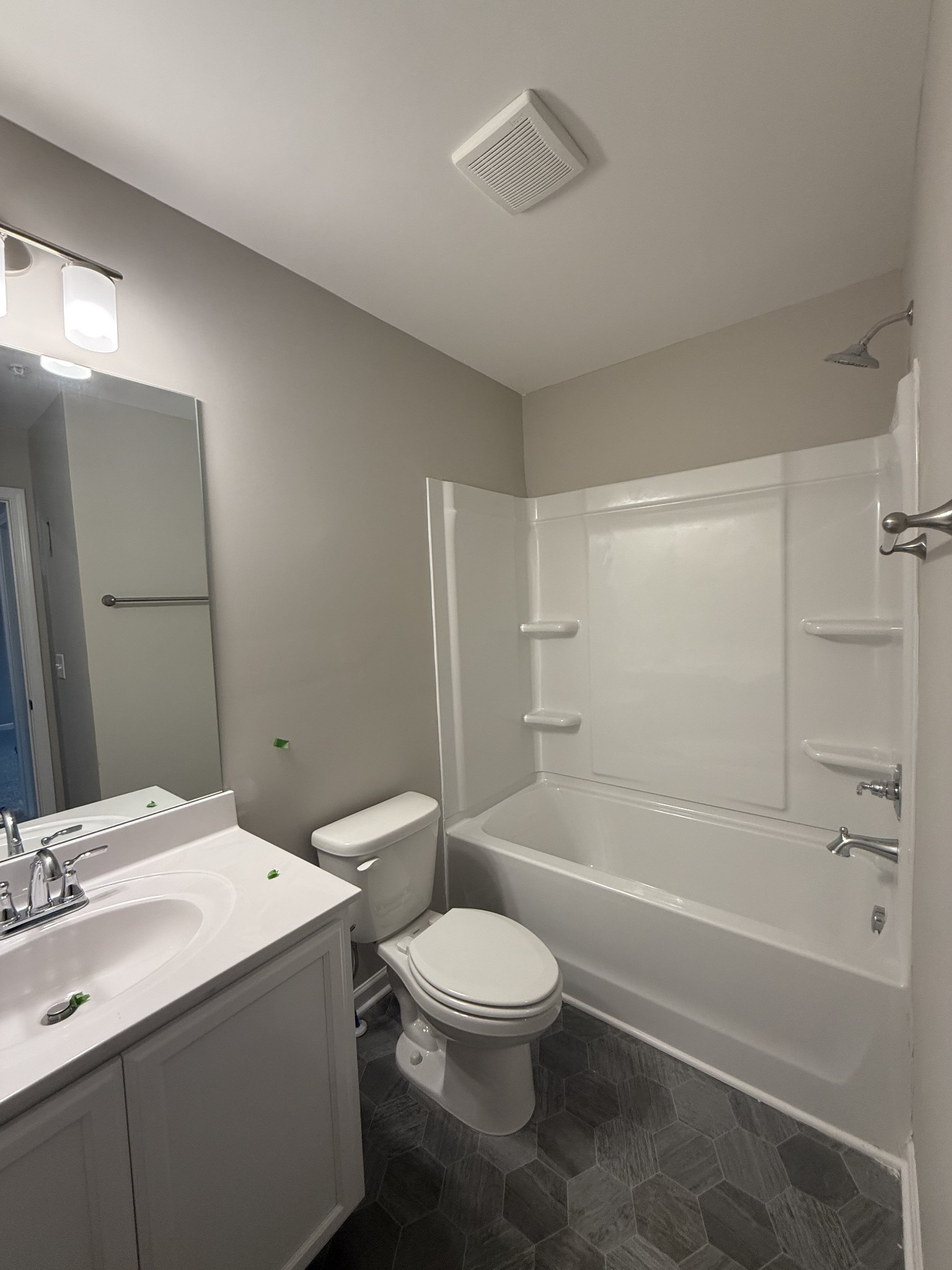 258 Selesia Lane Pleasant View, TN 37146 - Photo 10 of 17 a bathroom with a toilet a sink and a bathtub
