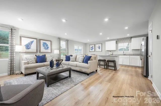 a living room with furniture and a table