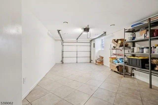 a view of a kitchen with electric appliances