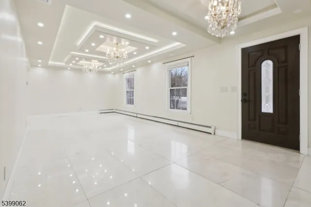 a kitchen with a sink and stainless steel appliances
