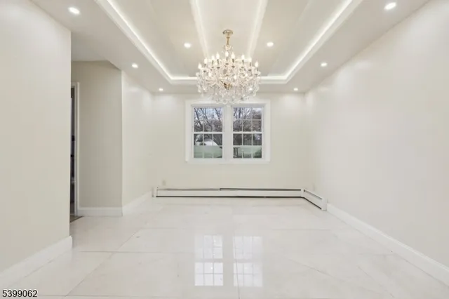 a kitchen with granite countertop stainless steel appliances and sink