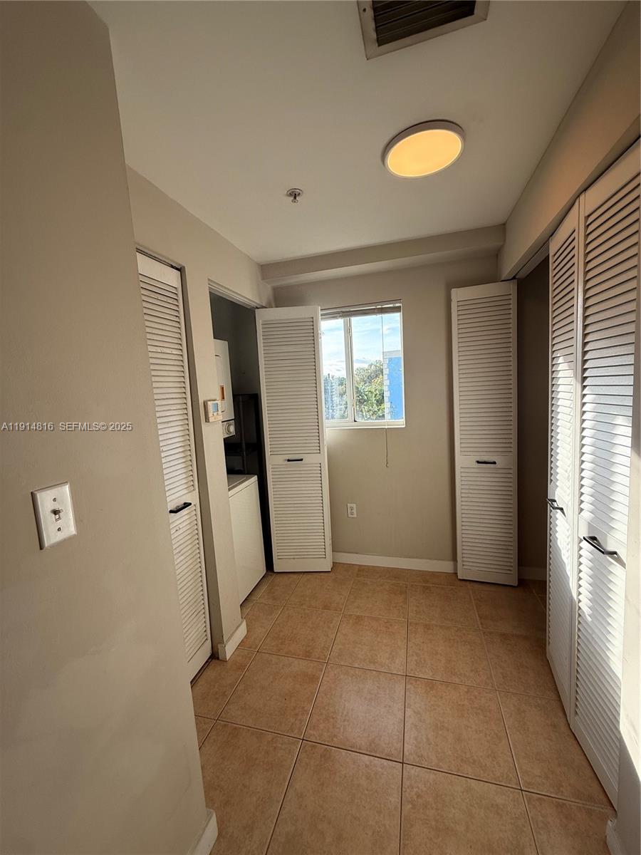 821 Southwest 2nd Street, Unit 1 Miami, FL 33130 - Photo 21 of 28 a view of an empty room