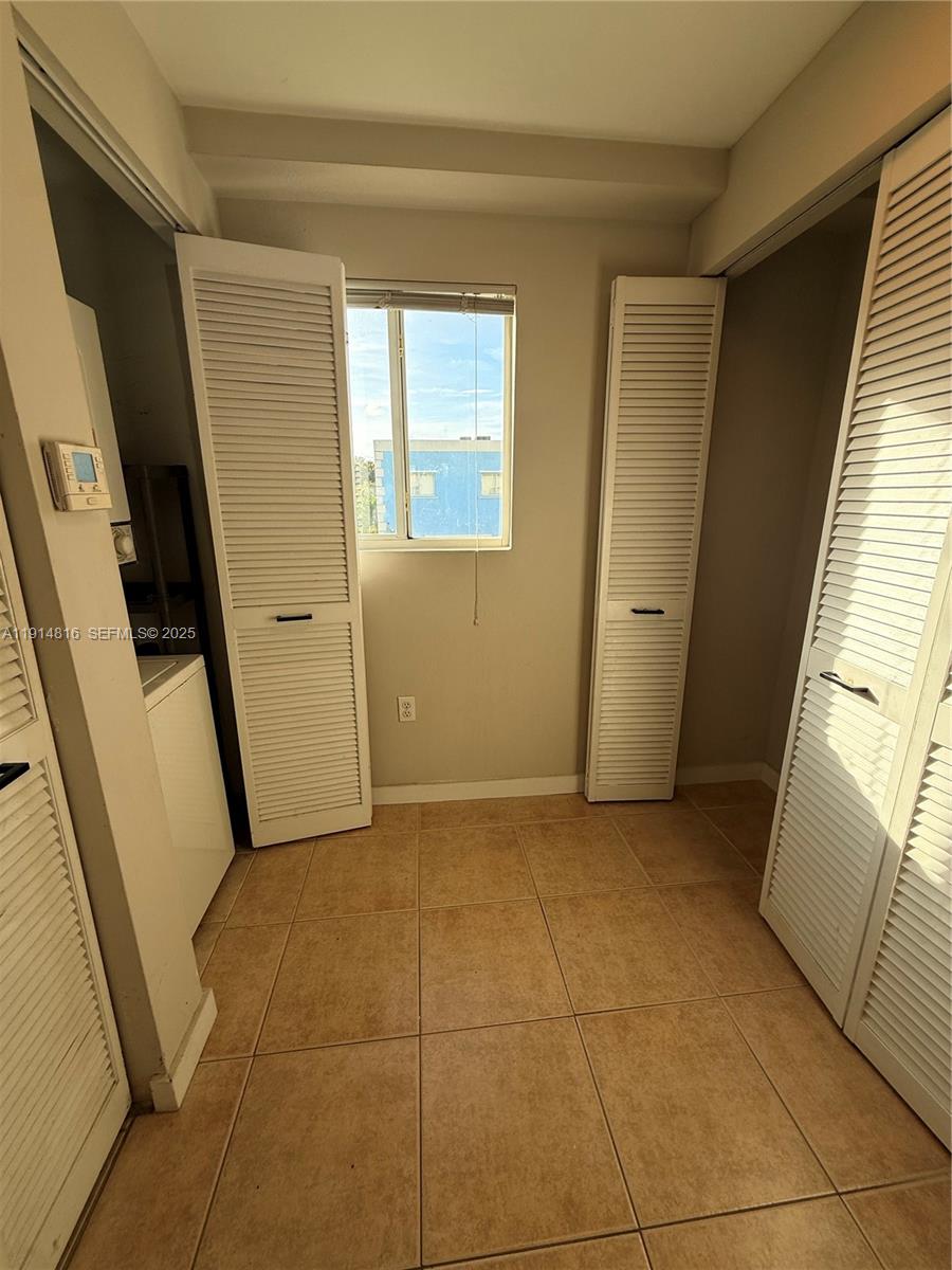 821 Southwest 2nd Street, Unit 1 Miami, FL 33130 - Photo 22 of 28 a view of an empty room with a window