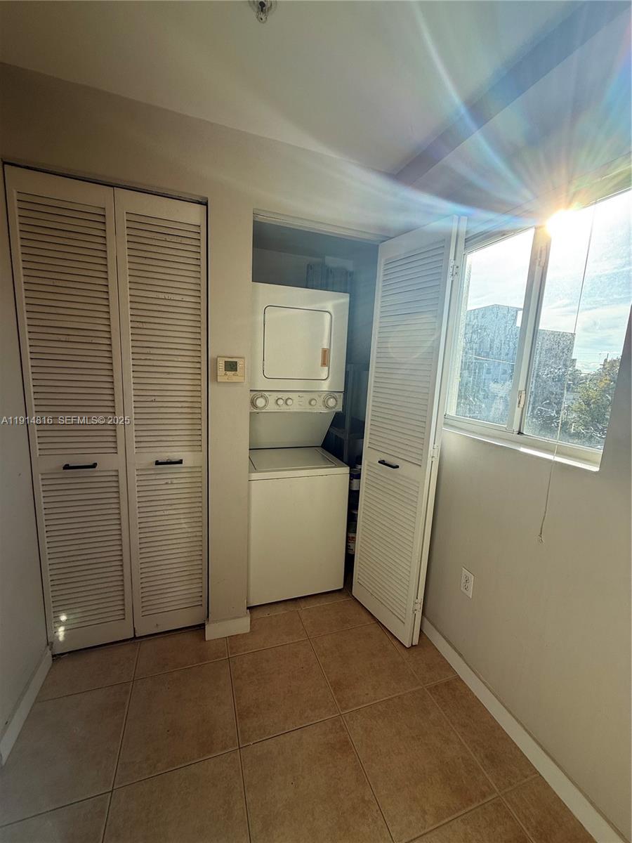 821 Southwest 2nd Street, Unit 1 Miami, FL 33130 - Photo 23 of 28 a view of utility room with washer and dryer