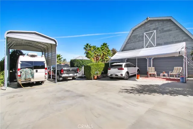 a view of a car park in front of a building