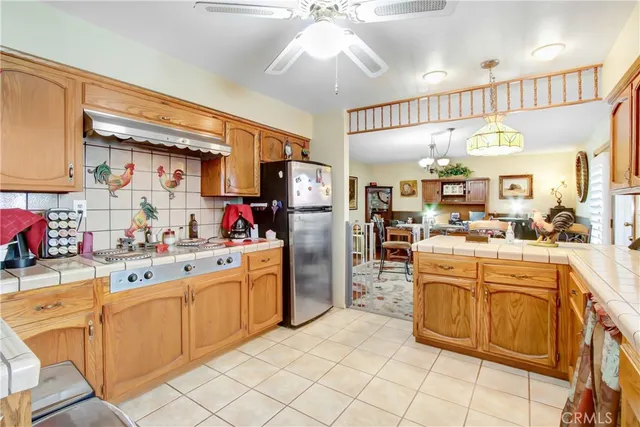 a kitchen with cabinets and window