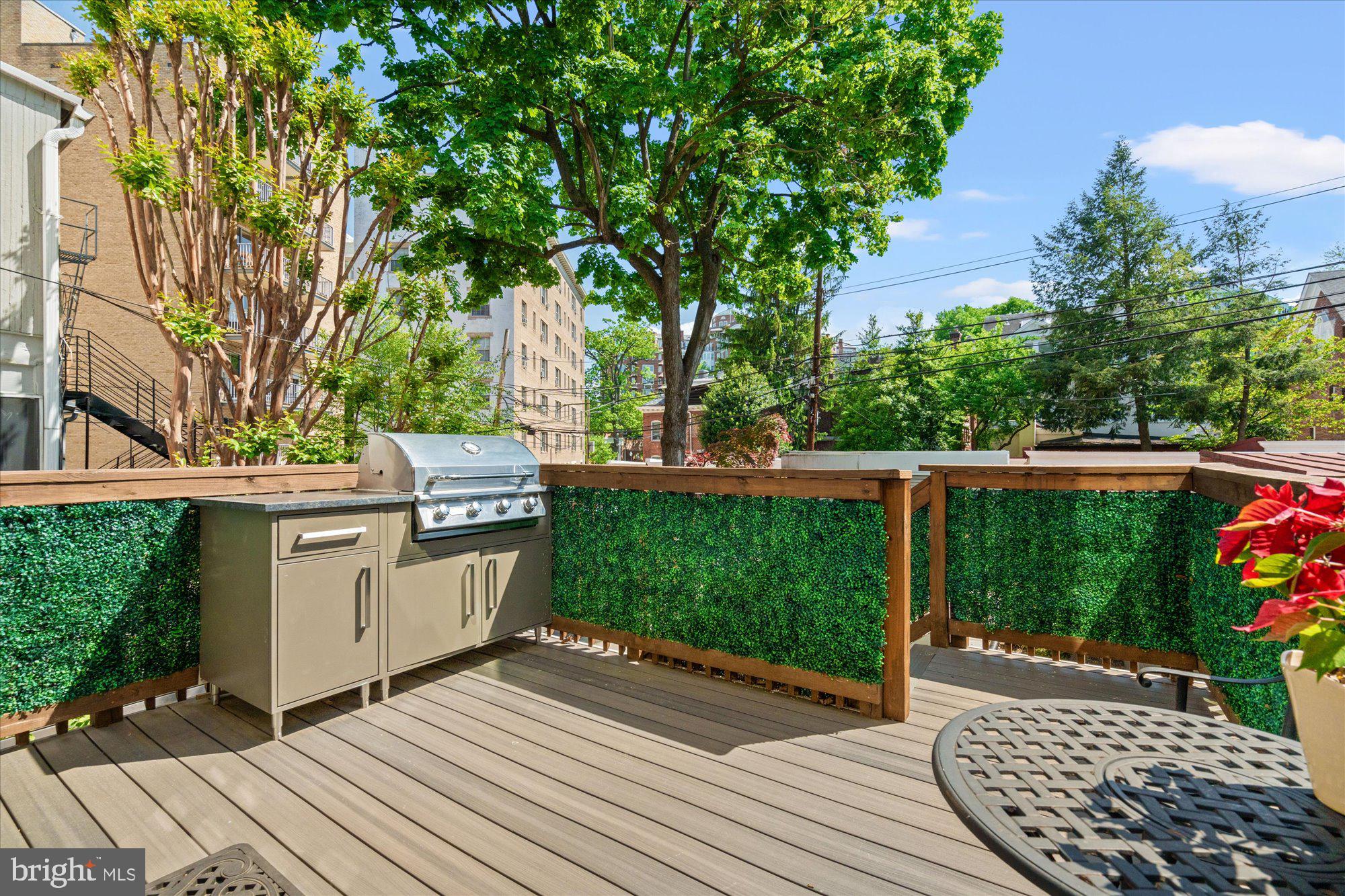 2610 Garfield Street Northwest Washington, DC 20008 - Photo 48 of 51 a view of a backyard with sitting area and garden
