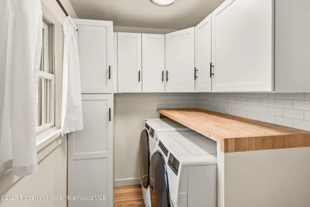 a view of walk in closet with window