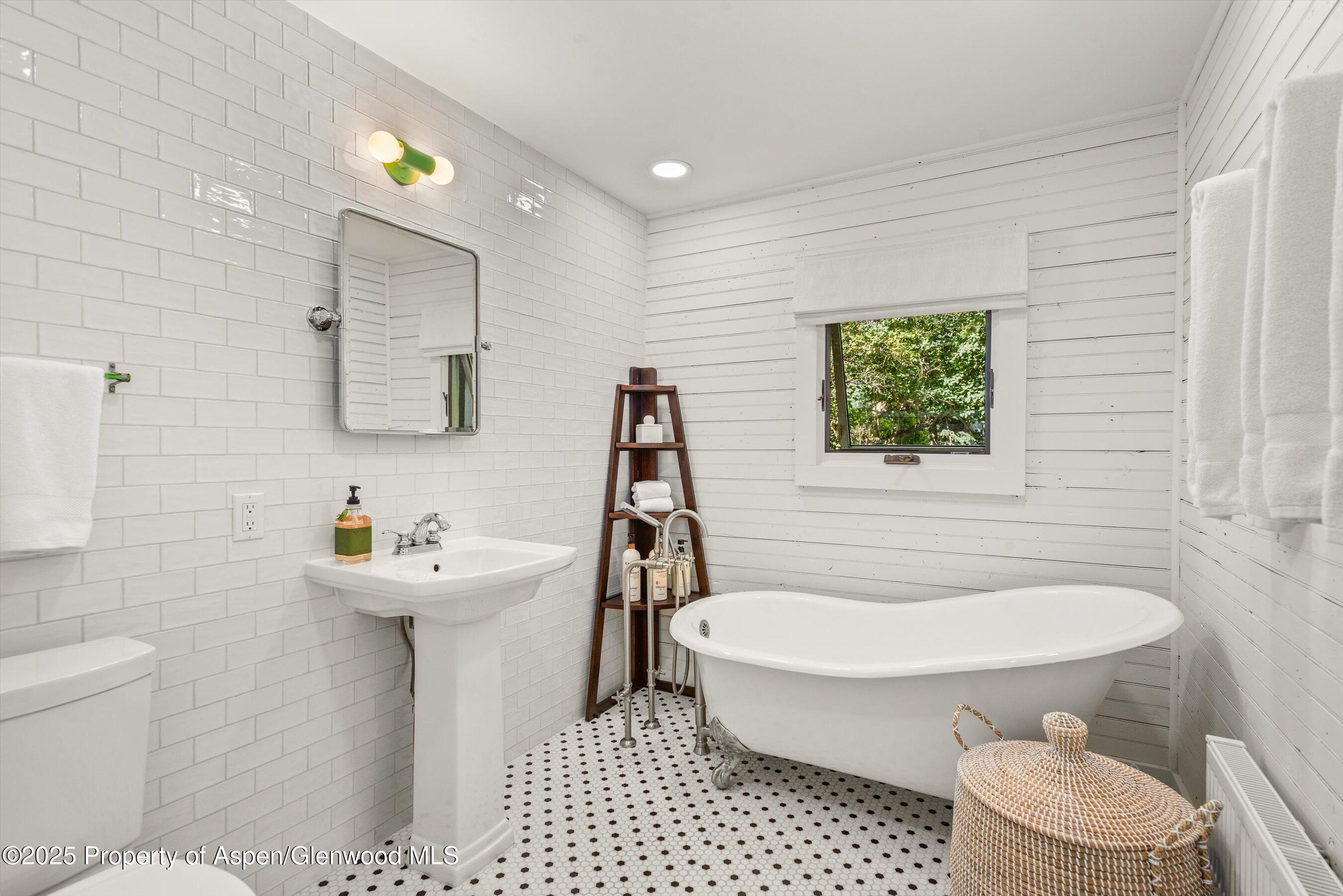 500 West Francis Street, Unit CARRIAGE HOUSE Aspen, CO 81611 - Photo 17 of 19 a bathroom with a sink toilet and shower