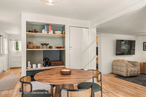 a view of a dining room with furniture