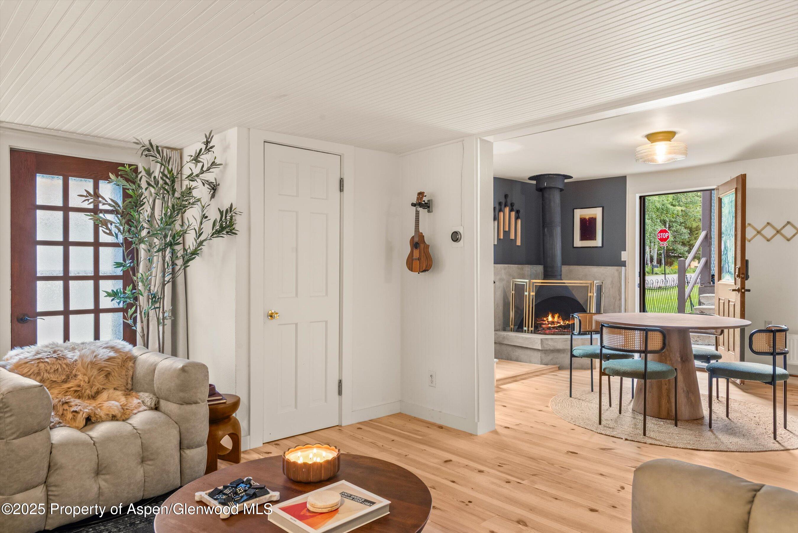 500 West Francis Street, Unit CARRIAGE HOUSE Aspen, CO 81611 - Photo 9 of 19 a bedroom with furniture and a large window