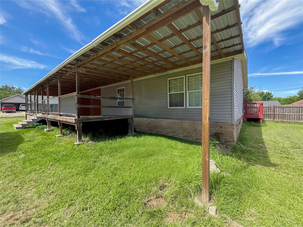 845 Caldwell Street Lexington, TX 78947 - Photo 20 of 39 a view of a backyard with sitting area