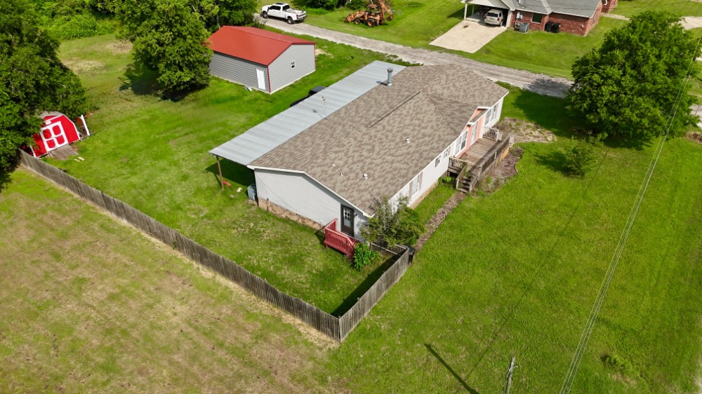 845 Caldwell Street Lexington, TX 78947 - Photo 28 of 39 Aerial view of property and surrounding area