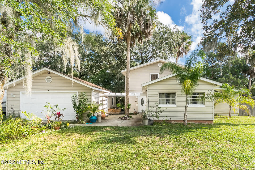 a front view of house with yard