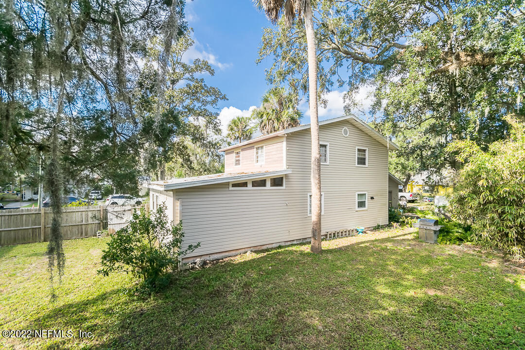 635 Jasmine Street Atlantic Beach, FL 32233 - Photo 18 of 20 a white house that has tree in front of it