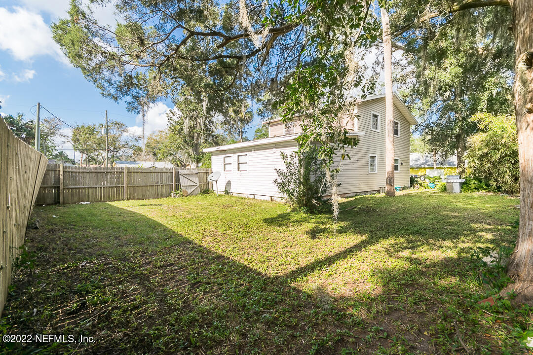 635 Jasmine Street Atlantic Beach, FL 32233 - Photo 19 of 20 a view of backyard of house with green space
