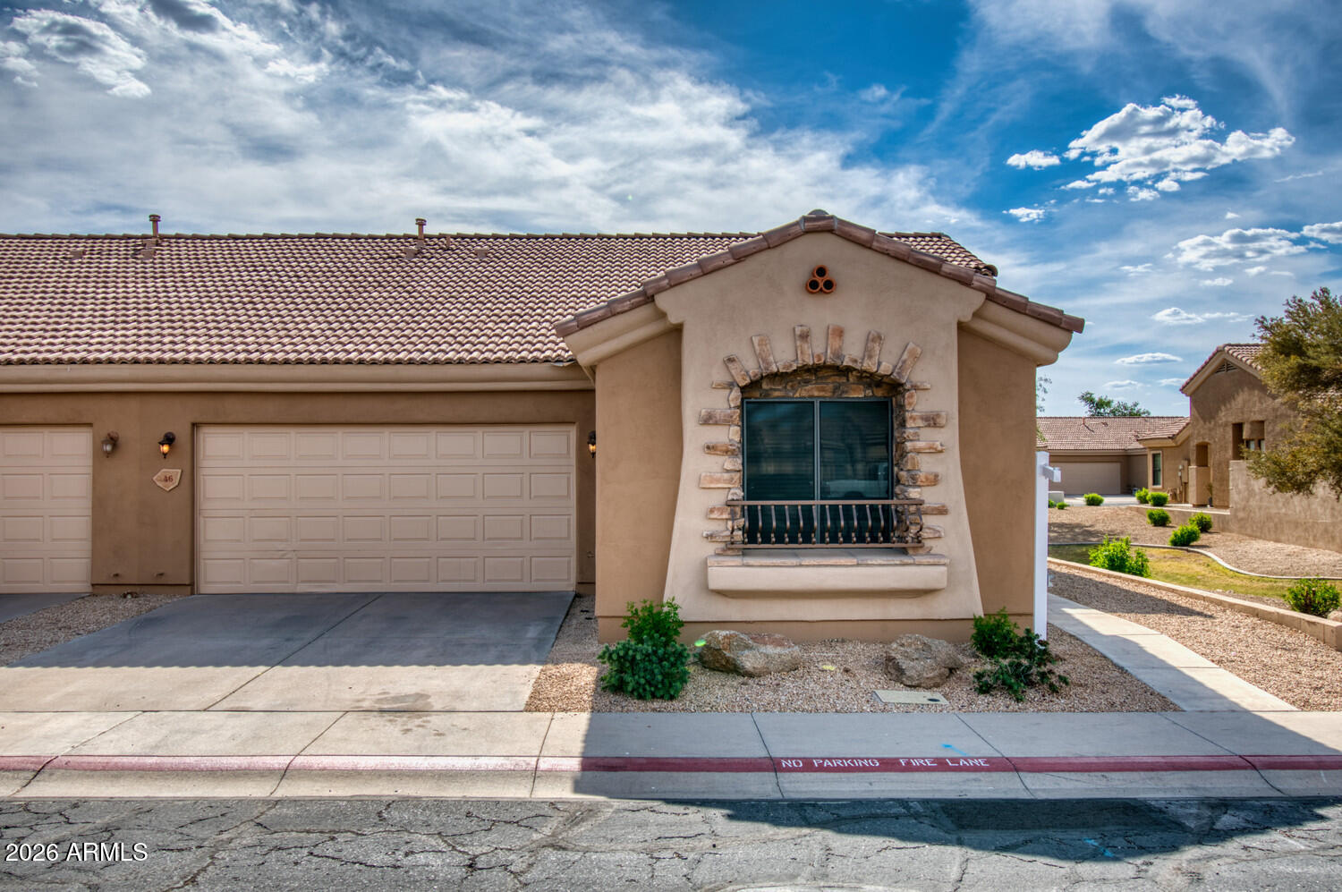 2565 South Signal Butte Road, Unit 46 Mesa, AZ 85209 - Photo 14 of 44 a front view of a house