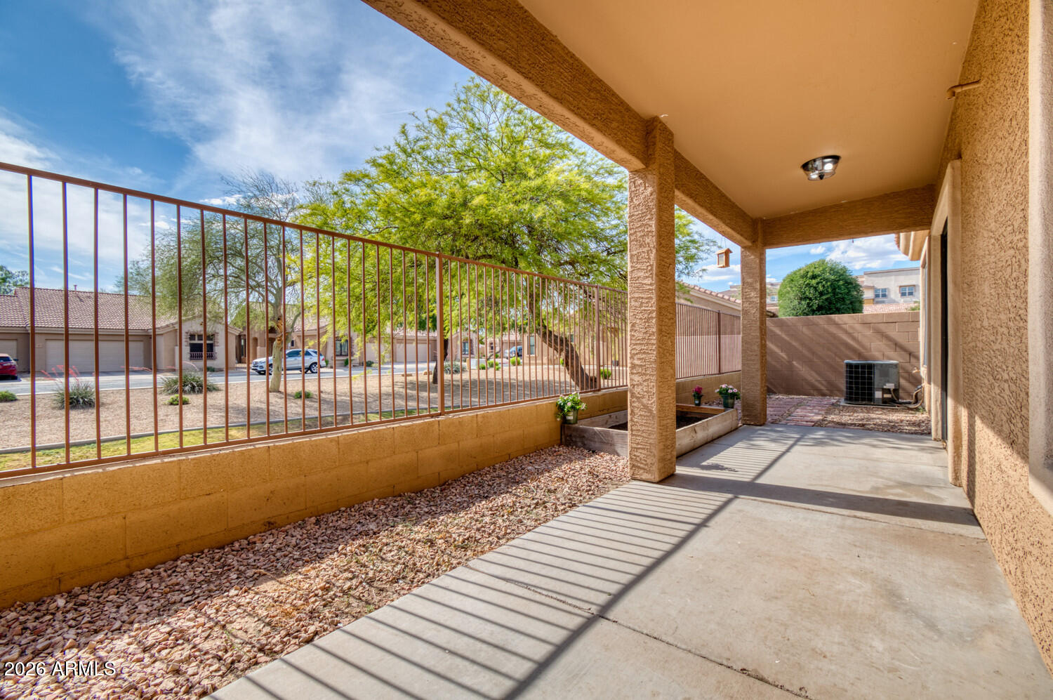 2565 South Signal Butte Road, Unit 46 Mesa, AZ 85209 - Photo 16 of 44 a view of a balcony with yard