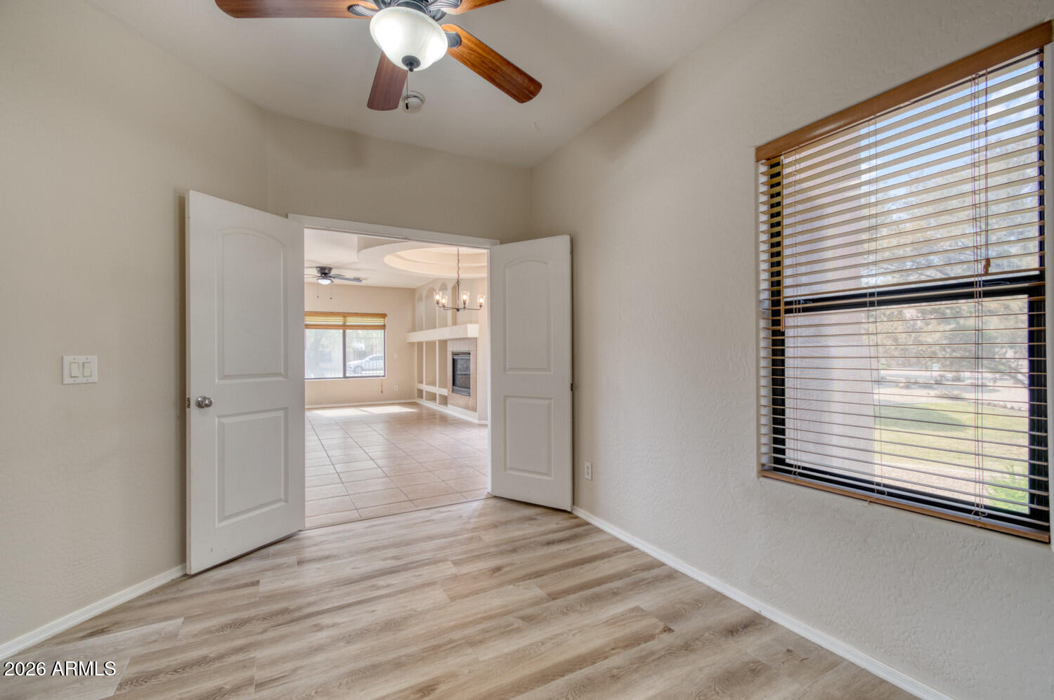 2565 South Signal Butte Road, Unit 46 Mesa, AZ 85209 - Photo 30 of 44 a view of empty room with wooden floor and fan