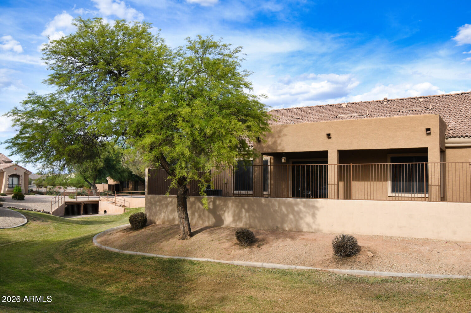 2565 South Signal Butte Road, Unit 46 Mesa, AZ 85209 - Photo 4 of 44 a view of a house with a yard