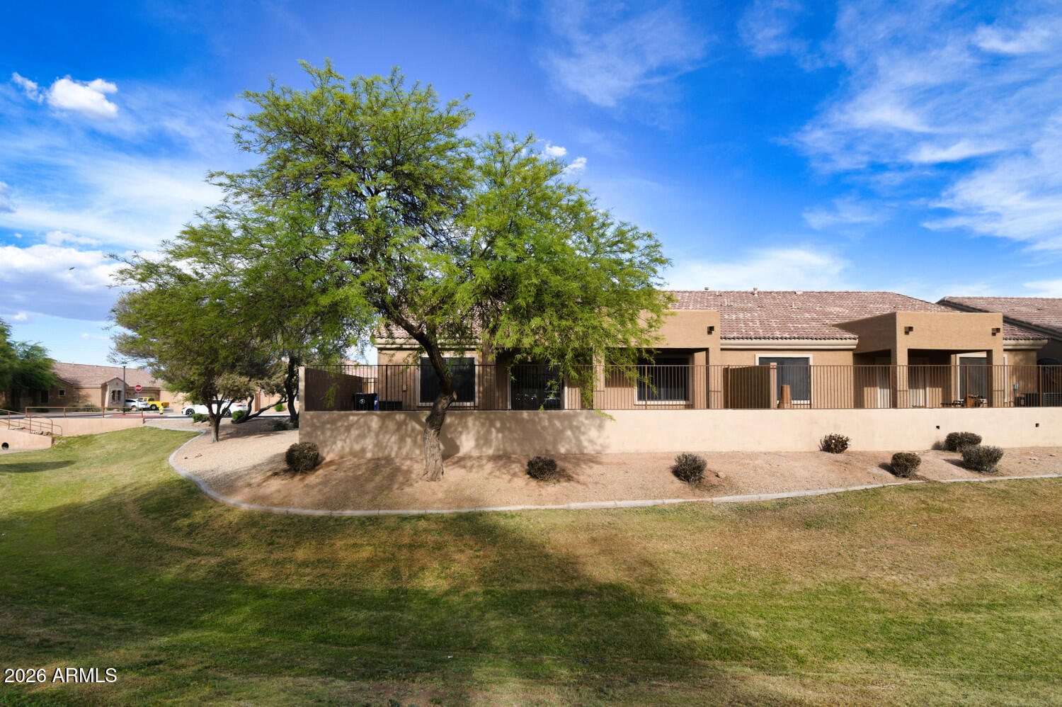 2565 South Signal Butte Road, Unit 46 Mesa, AZ 85209 - Photo 5 of 44 a view of a house with a yard