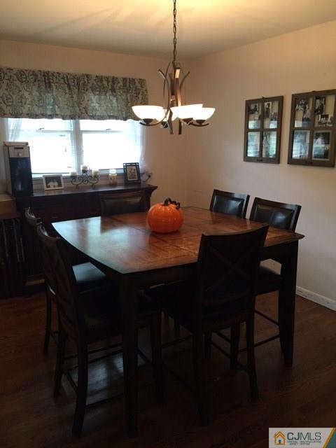 88 Dellwood Road Edison, NJ 08820 - Photo 6 of 16 a view of a dining room with furniture and wooden floor