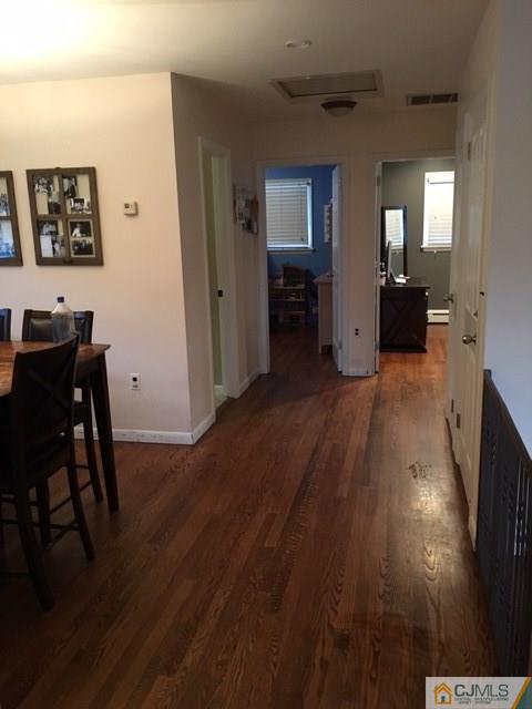 88 Dellwood Road Edison, NJ 08820 - Photo 8 of 16 a living room with furniture and a wooden floor