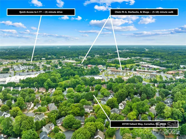 a view of a yard with sitting area