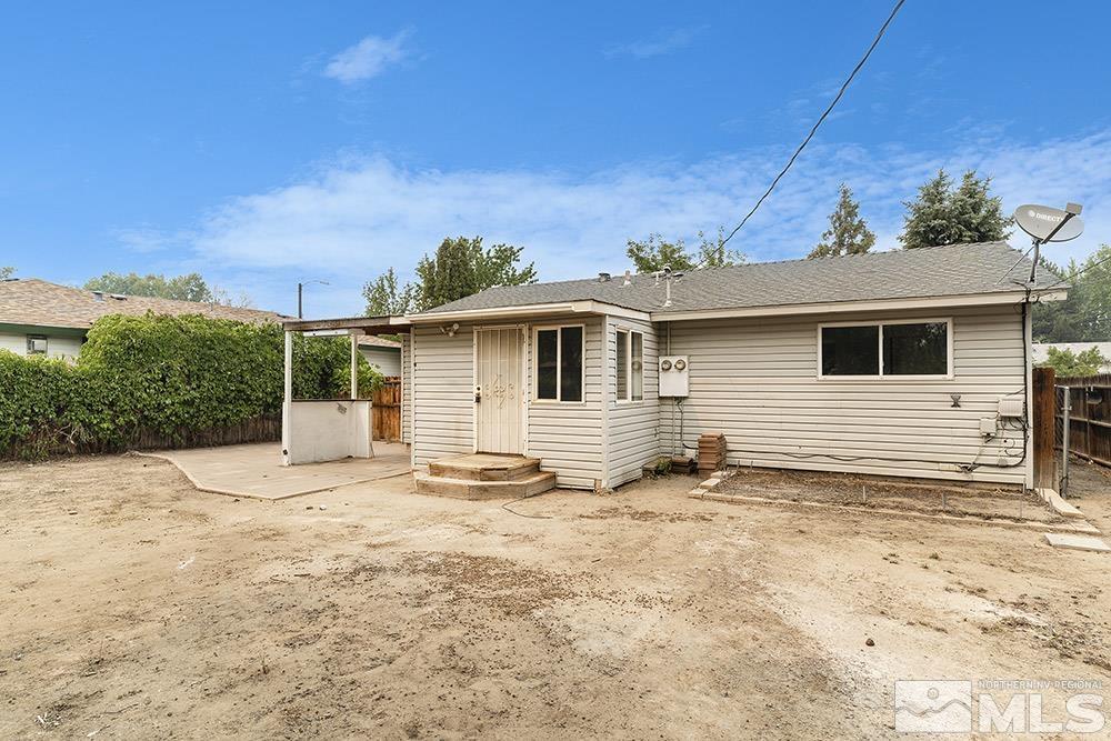 3408 Rauscher Drive Reno, NV 89503 - Photo 12 of 16 a view of a house with a yard